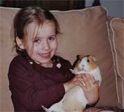 Petite fille au hamster